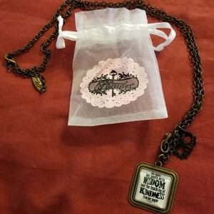 Plunder necklace, "She opens her mouth to wisdom..